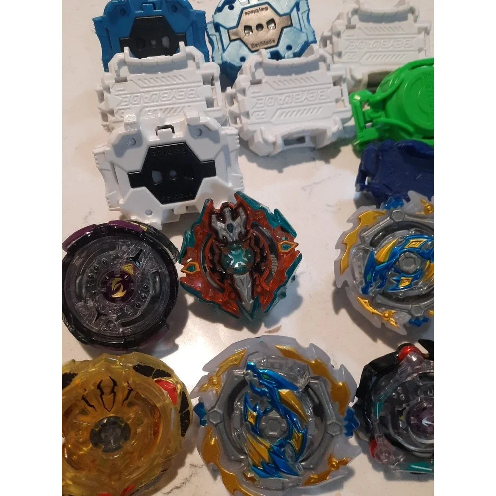 Lot Of 8 Beyblade And Different Parts